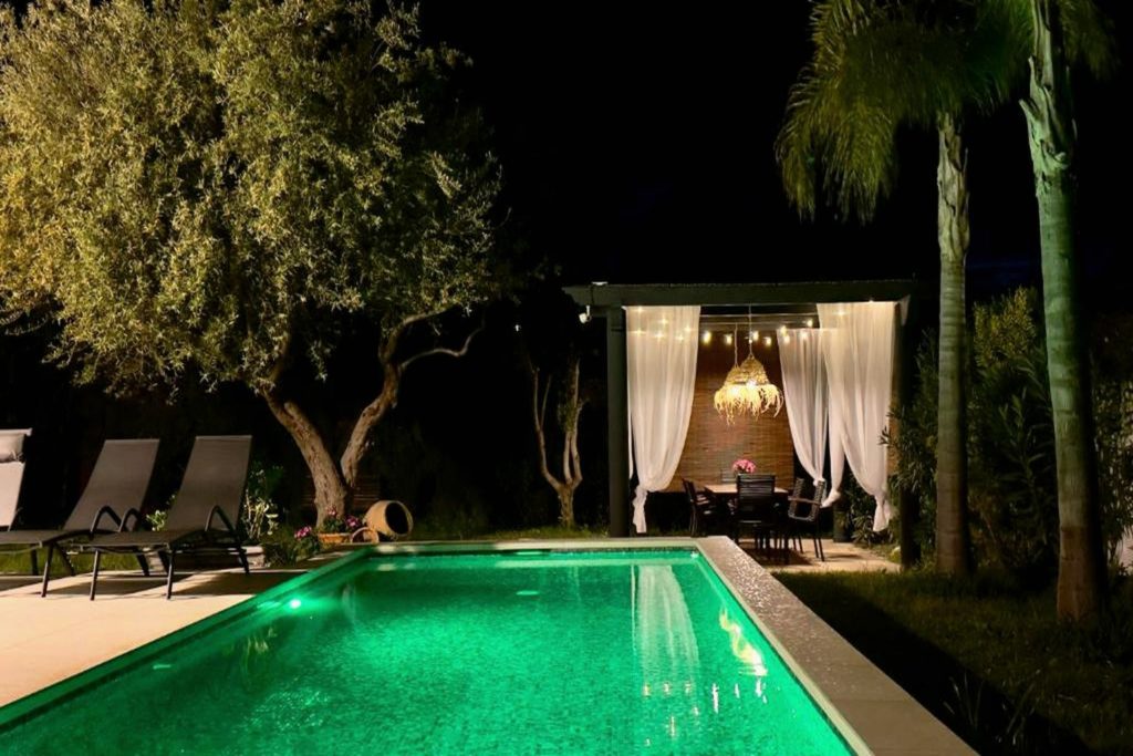 The pool lit up at night