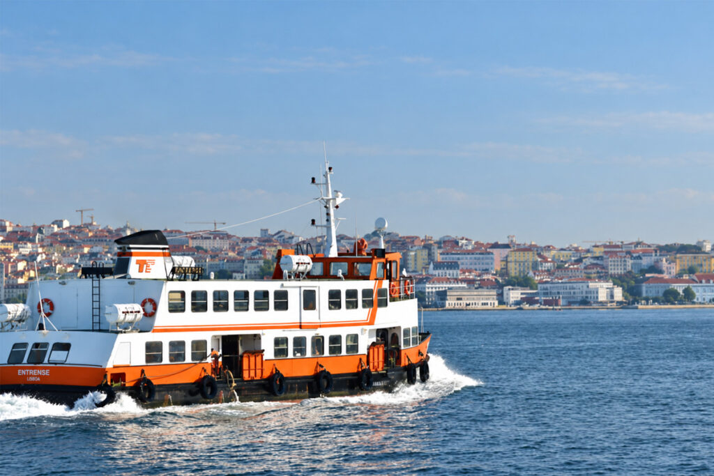 The Cacilhas ferry crossing the Tejo, with Lisbon behind