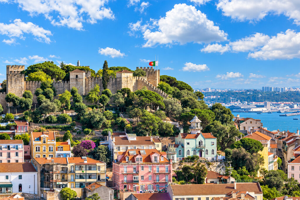 Aerial view of the Castelo de São Jorge on its hill above Alfama's rooftops