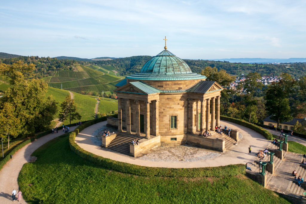 Aerial view of the domed Grabkapelle, its circular path and the vineyards on the Württemberg