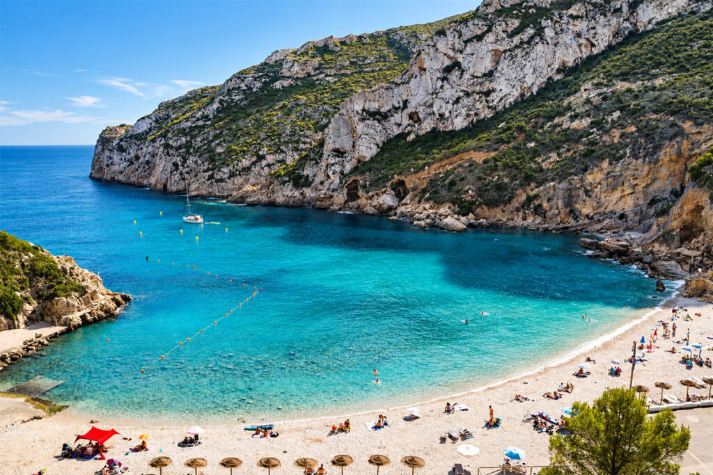 The turquoise water and pine-backed cliffs of Cala Granadella