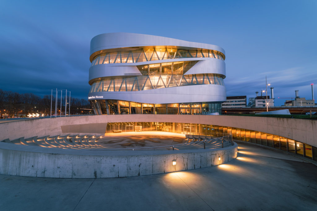 The spiralling façade of the Mercedes-Benz Museum at dusk, Stuttgart-Untertürkheim