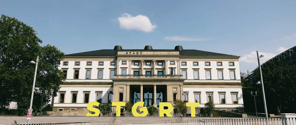 The classical Wilhelmspalais, now the StadtPalais city museum, with a yellow STGRT sign on the forecourt