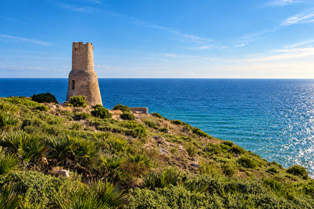 The Torre del Gerro watchtower on the cliffs above the sea